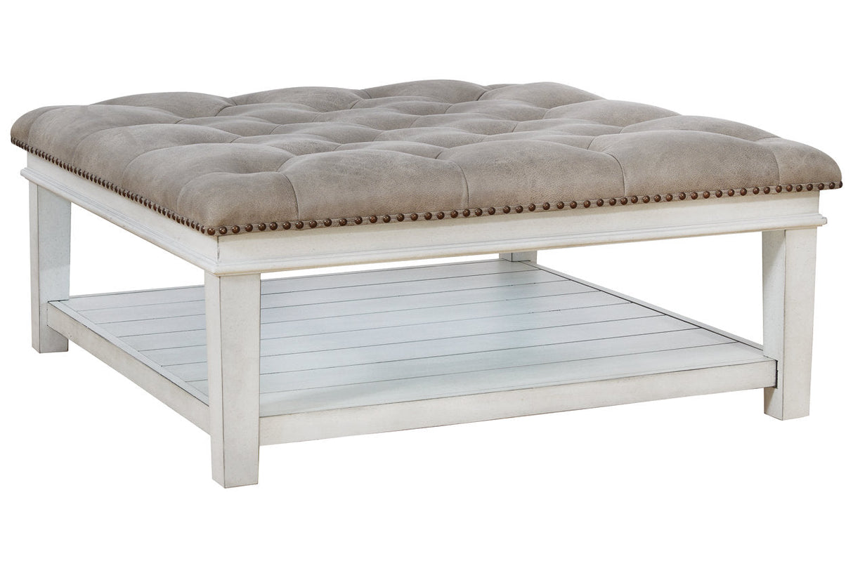 Kanwyn Whitewash Upholstered Ottoman Coffee Table